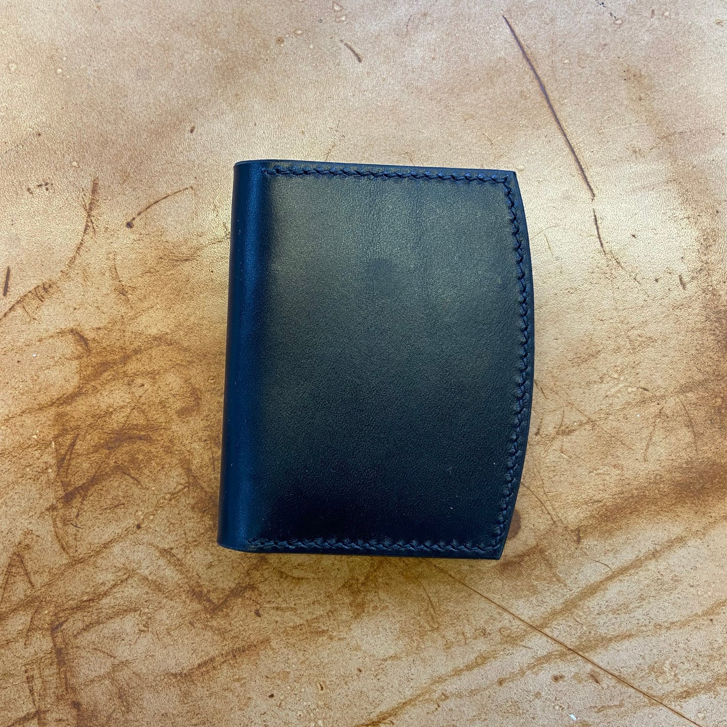 Vertical curved card holder